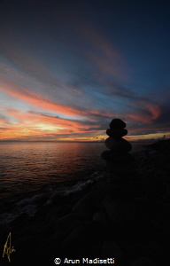 Standing stones and sunset by Arun Madisetti 